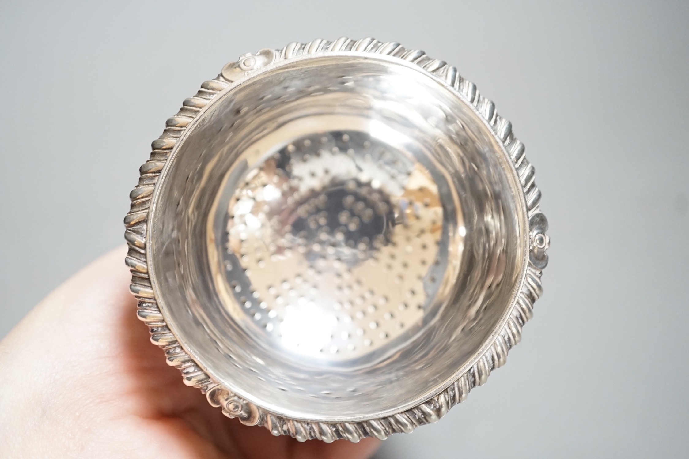 A George III Scottish silver wine funnel, George MacHattie, Edinburgh, 1818, with muslin ring, height 14.4cm.